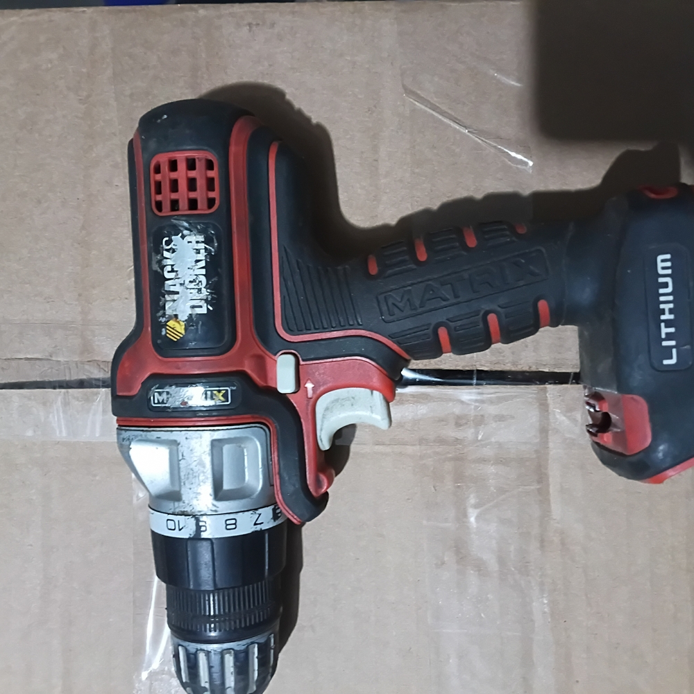 Black & Decker Cordless Drill Driver in Black and Red With Charger And Cord
